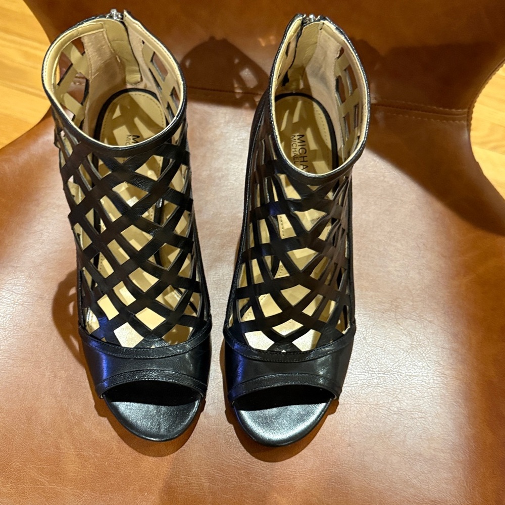 Michael Kors Bootie heels. 8, leather, almost new